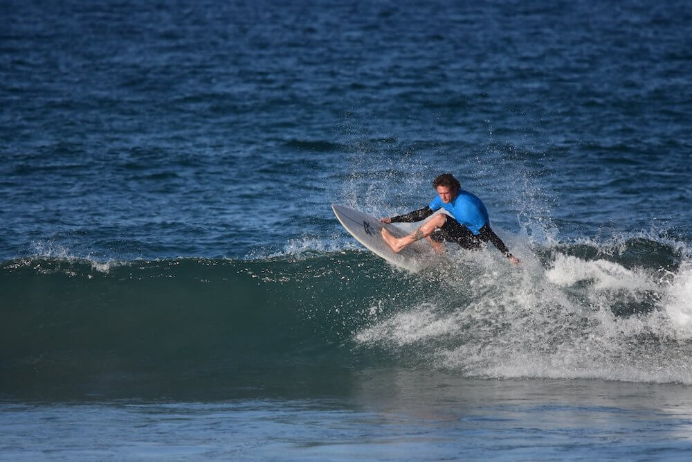 photo of surfer at Woolgoolga